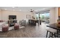 Spacious open-concept living area with modern furnishings and tile flooring at 5100 E Rancho Paloma E Dr # 1046, Cave Creek, AZ 85331
