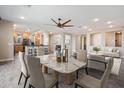 Stylish living room and dining area with an open floor plan and contemporary design at 5100 E Rancho Paloma E Dr # 1046, Cave Creek, AZ 85331