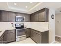 Well-equipped kitchen showcasing stainless steel appliances and ample counter space for food preparation at 7960 E Camelback Rd # 209, Scottsdale, AZ 85251