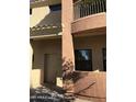 Exterior shot showing number 7, windows, and balcony of the building at 16216 N 30Th Pl, Phoenix, AZ 85032