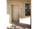 Close-up of the unit's front door showing number 7 and neutral tones at 16216 N 30Th Pl, Phoenix, AZ 85032