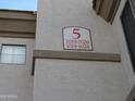 A close-up of building numbers with unit range listed underneath at 1941 S Pierpont Dr # 1025, Mesa, AZ 85206