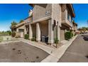 Corner lot with a stucco exterior, tiled roof, and an attached garage at 1001 N Pasadena -- # 5, Mesa, AZ 85201