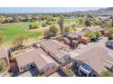 Sprawling desert home near golf course featuring desert landscaping and stunning golf course views at 7227 S Golfside Ln, Phoenix, AZ 85042