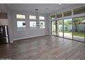 Bright living area with a view of the backyard and large sliding doors at 1956 W Rowel Rd, Phoenix, AZ 85085