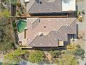 Aerial view of a home featuring a private backyard oasis with a sparkling pool at 6827 E Eagle Feather Rd, Scottsdale, AZ 85266