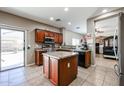 Functional kitchen featuring an island, stainless steel appliances, ample counter space, and recessed lighting at 10037 W Chipman Rd, Tolleson, AZ 85353
