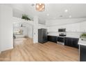 Spacious kitchen with stainless steel appliances and an open floor plan at 10241 E La Palma Ave, Gold Canyon, AZ 85118