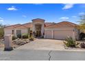 Beautiful single-Gathering home with a three-car garage, desert landscaping, and a tile roof at 11922 N 120Th St, Scottsdale, AZ 85259