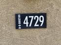 Close-up of the house number plaque showing the address 4729 at 4729 E Chromium Rd, San Tan Valley, AZ 85143