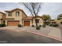 Charming single-Gathering home with desert landscaping, gravel, and a paved walkway to the front door at 5415 E Mckellips Rd # 104, Mesa, AZ 85215