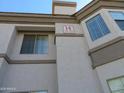 Low angle view of a building with windows, showing the unit numbers and exterior design at 1941 S Pierpont Dr # 2082, Mesa, AZ 85206