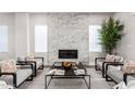 Bright living room with a modern fireplace and stylish furniture arrangement at 5250 E Deer Valley Dr # 243, Phoenix, AZ 85054