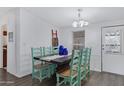 Dining area with a large table, chairs, and natural light, perfect for Gathering gatherings at 201 S Greenfield Rd # 255, Mesa, AZ 85206