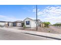 Charming single-Gathering home in a well-maintained community with beautiful landscaping at 4383 N 203Rd Dr, Buckeye, AZ 85396