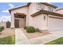Inviting front entrance featuring a covered porch, well-kept landscaping, and a classic-style front door at 1520 E Flint St, Chandler, AZ 85225