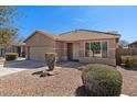 Charming single-story home with desert landscaping and a two-car garage at 4119 E Sundance Ave, Gilbert, AZ 85297
