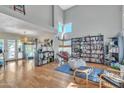 Bright living room features hardwood floors, vaulted ceilings, and lots of natural light at 3932 W Rene Dr, Chandler, AZ 85226