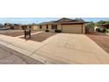 Charming single-story home with a well-maintained front yard and a welcoming walkway at 1619 E Del Rio Dr, Tempe, AZ 85282