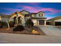 Attractive home features a well-manicured front yard, mature landscaping, and a neatly paved driveway at 1874 E Crescent Way, Chandler, AZ 85249