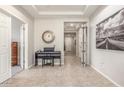 Bright entryway with decorative accents and tile flooring. Entry is illuminated by recessed lighting at 2167 W Ethan Ct, San Tan Valley, AZ 85144