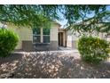 Charming desert landscaping around the front porch and entry at 2167 W Ethan Ct, San Tan Valley, AZ 85144