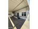 Wide covered patio providing a relaxing outdoor space with steps leading up to the entrance at 3520 N Yucca Dr, Florence, AZ 85132