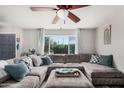 Inviting living room featuring a plush sectional sofa and abundant natural light at 8554 E Mcdonald Dr, Scottsdale, AZ 85250