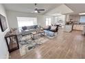 Spacious living room offers a comfortable seating arrangement and seamless flow to the dining and kitchen areas at 2416 W Stottler Dr, Chandler, AZ 85224