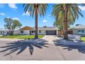 Attractive single-Gathering home enhanced by mature trees and fresh landscaping at 8215 E Virginia Ave, Scottsdale, AZ 85257