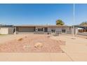 Charming single-story home with a well-maintained yard and inviting curb appeal at 1112 W Farmdale Ave, Mesa, AZ 85210