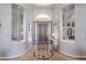 Foyer boasting tile flooring, and a decorative medallion under an arched ceiling at 11224 E Carol Ave, Scottsdale, AZ 85259