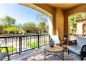 Comfortable porch with outdoor seating, offering a relaxing view of the neighborhood and pleasant ambiance at 21152 W Sunrise Ln, Buckeye, AZ 85396