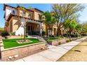 Attractive street view highlighting well-maintained homes, lush landscaping, and a welcoming community feel at 21152 W Sunrise Ln, Buckeye, AZ 85396