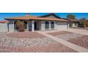 A single-story home with a brown roof and desert-friendly landscaping in the front yard at 2502 E Malibu Dr, Tempe, AZ 85282