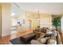 Open floorplan featuring living room and kitchen with modern appliances at 4546 E Villa Rita Dr, Phoenix, AZ 85032