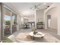 Spacious living room with a view of the backyard, seamlessly connecting indoor and outdoor spaces at 4815 E Fernwood Ct, Cave Creek, AZ 85331
