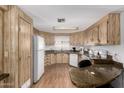 Traditional style kitchen featuring wood cabinets, countertops, and appliances, creating a functional cooking space at 9333 E University Dr # 113, Mesa, AZ 85207