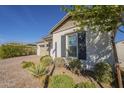 Attractive single-story home with a desert landscape, providing easy maintenance at 10134 E Supernova Dr, Mesa, AZ 85212