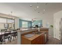 Bright and open living space seamlessly connects to the kitchen and dining area at 1330 S Aaron -- # 218, Mesa, AZ 85209