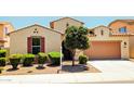 Inviting single-Gathering home with a well-maintained front yard, desert landscaping, and a cozy entrance at 1437 E Flamingo Way, Gilbert, AZ 85297