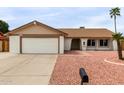Charming single-story home with a two-car garage and desert landscaping at 16010 N 47Th Dr, Glendale, AZ 85306