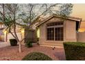Attractive home with a well-kept front yard and large front windows at 2123 S Bristol Dr, Mesa, AZ 85209