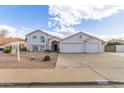Inviting single-Gathering home with a three-car garage and a well-manicured front yard at 2257 E Lockwood St, Mesa, AZ 85213