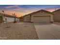 Charming single-story home featuring a neutral color palette, tile roof, and low-maintenance landscaping at 4213 E Shapinsay Dr, San Tan Valley, AZ 85140