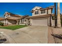 Home with a two-car garage, tile roof and driveway at 6857 S Roosevelt St, Tempe, AZ 85283