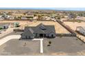 Bird's-eye view of the front exterior, manicured yard, and landscaping features at 34949 N Donald Way, San Tan Valley, AZ 85140