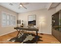 Inviting office space with natural light, ceiling fan, modern desk, and stylish decor at 18611 E Raven Dr, Queen Creek, AZ 85142