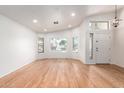 Bright and spacious living room features beautiful hardwood floors and lots of natural light at 1920 E Belmont Dr, Tempe, AZ 85284