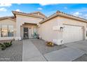 Well-maintained single-story home with desert landscaping and attached two-car garage at 2537 E Vista Bonita Dr, Phoenix, AZ 85024